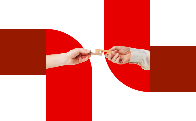 Duas mãos seguram dois blocos de madeira que se encaixam no ar representando o peer-to-peer.